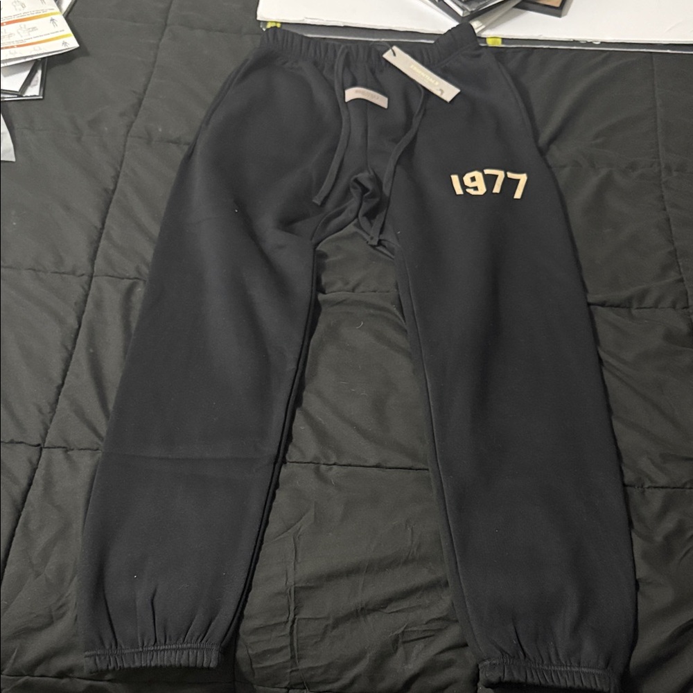 Fear of God Black Sweatpants with Cream Logo